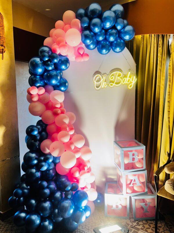 Deluxe Baby Shower Balloon Set in pastel colors, including baby blue, pink, and white, with foil and latex balloons perfect for baby shower decor.