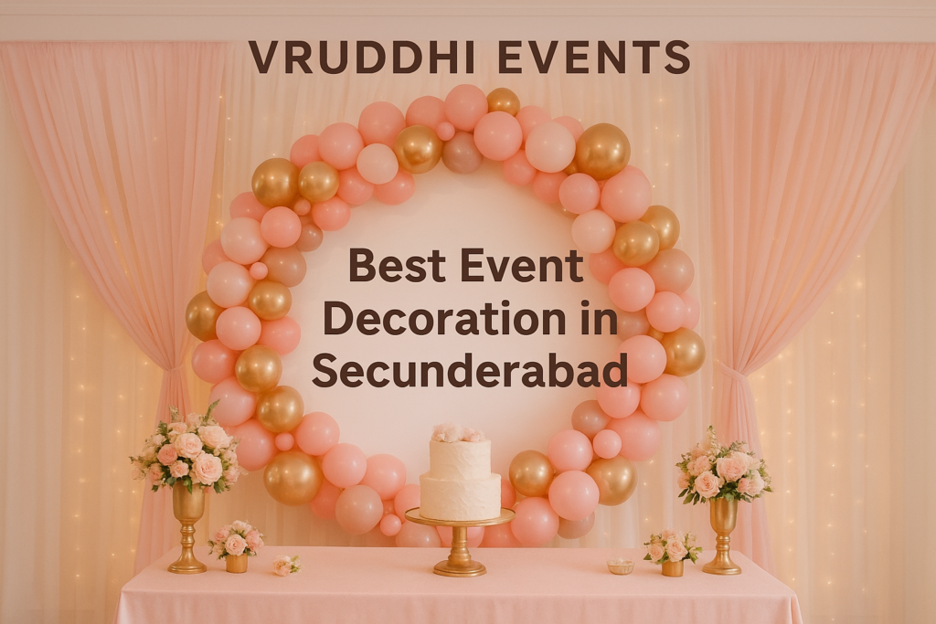 Elegant balloon arch and floral decoration setup by Vruddhi Events with a pink and gold theme, showcasing the best event decoration in Secunderabad